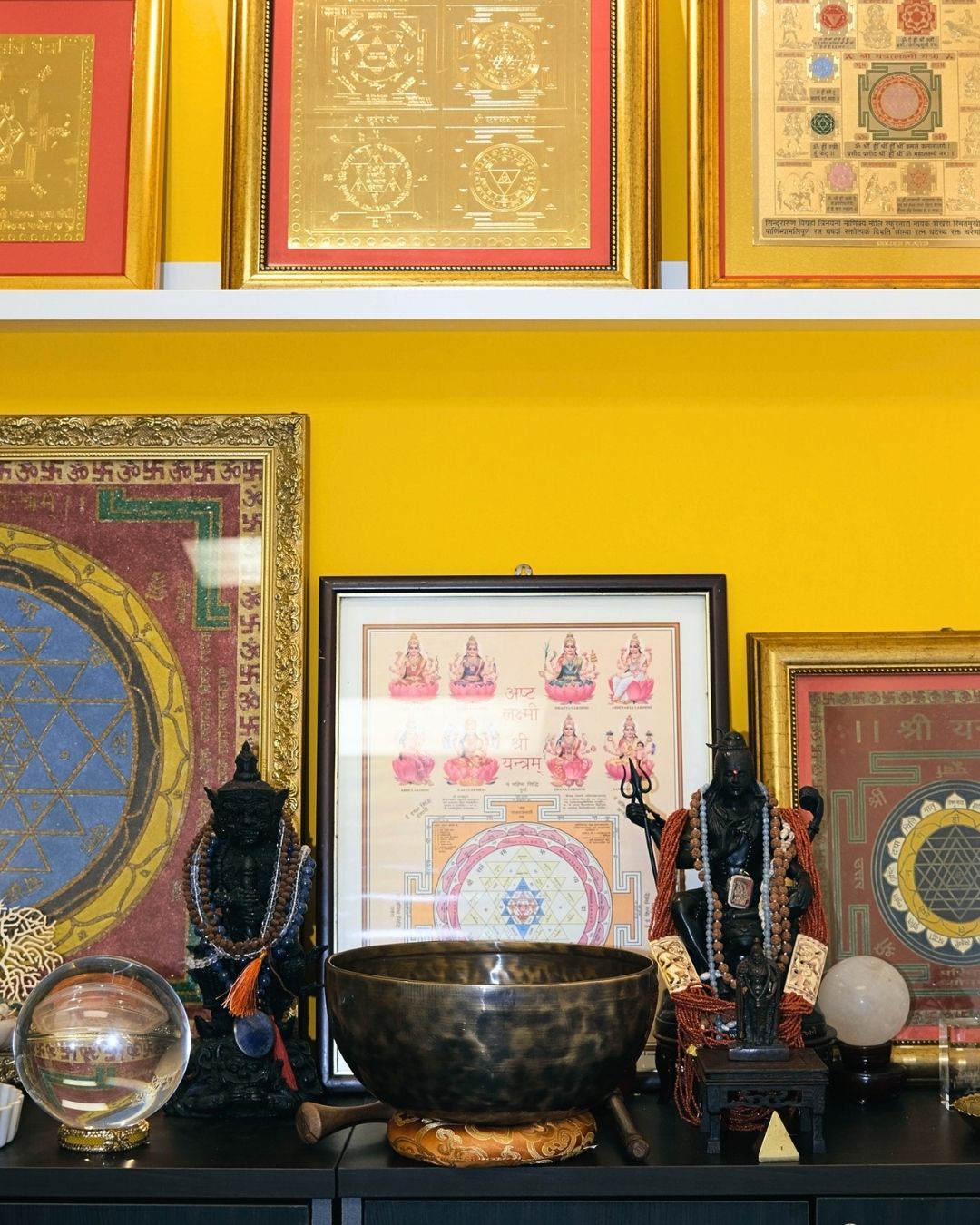 Buddha statues with Thai yantra wall art
